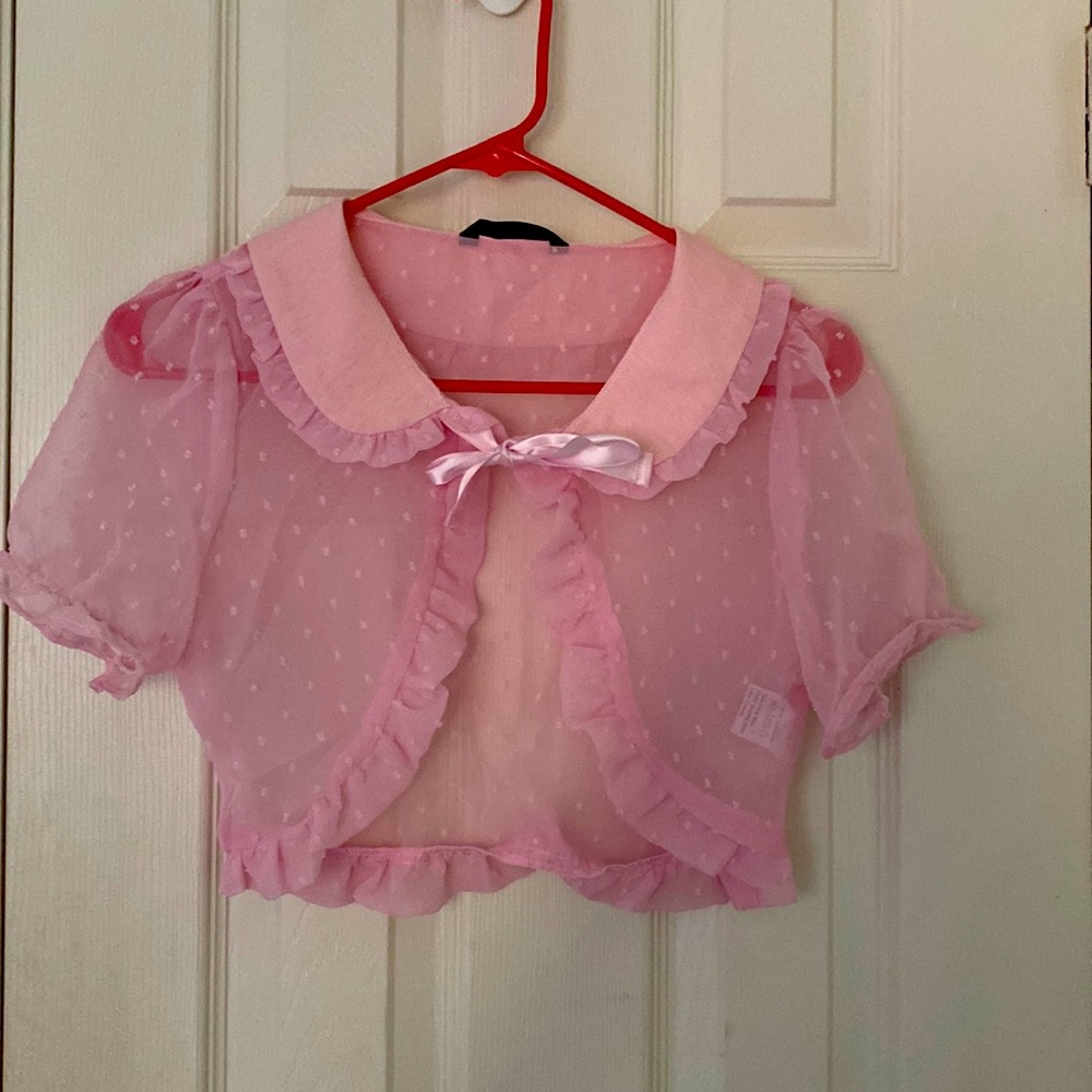 Beautiful light pink lady top, new without tags, never worn from smoke free home